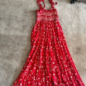 Free people red jumpsuit.  Super chic and comfortable.  Great condition!